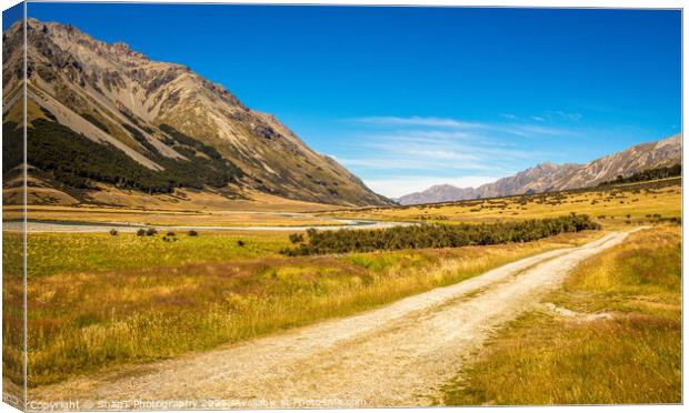A track in the upper Ahuriri River valley on a sunny summers day Canvas Print by SnapT Photography