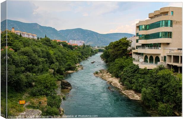 The treelined fast flowing Neretva river in Morstar Canvas Print by SnapT Photography