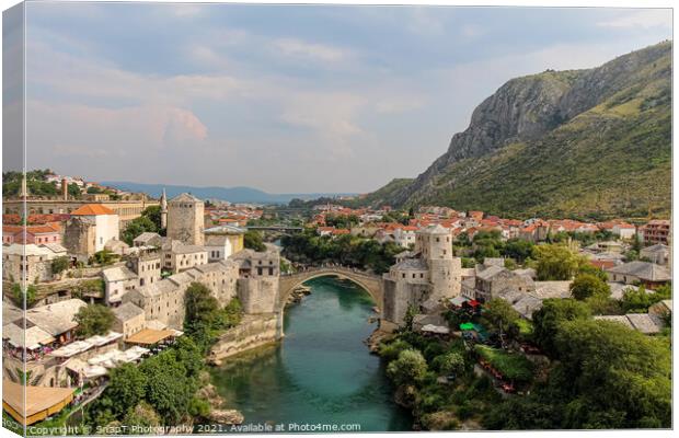The Old Bridge in Mostar across the Neretva River Canvas Print by SnapT Photography