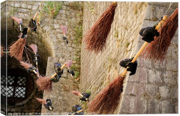 Flying brooms at the city walls in the old town in Kotor, Montenegro. Canvas Print by SnapT Photography