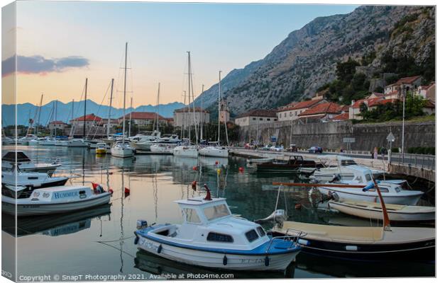 Sunset at the harbour with boats, in the Old Town of Kotor, Montenegro Canvas Print by SnapT Photography