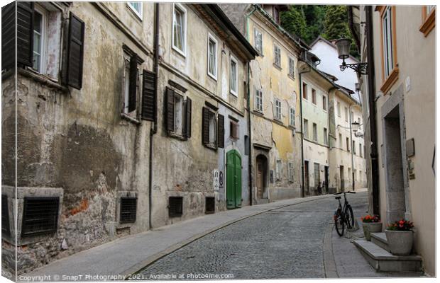 An old, historic, medieval street in Ljubljana, near Ljubljana castle, Slovenia Canvas Print by SnapT Photography