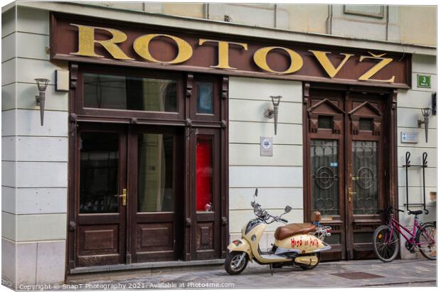 Rotovz or City Hall in Mestni Trg, with a Vespa parked outside, east Ljubljana Canvas Print by SnapT Photography