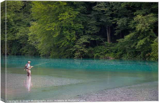A fisherman at the Soca and Tolminka River confluence at Tolmin, Slovenia Canvas Print by SnapT Photography