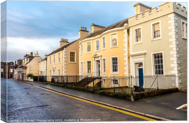 Buildings in the old High Street in Kirkcudbright, Galloway, Scotland Canvas Print by SnapT Photography