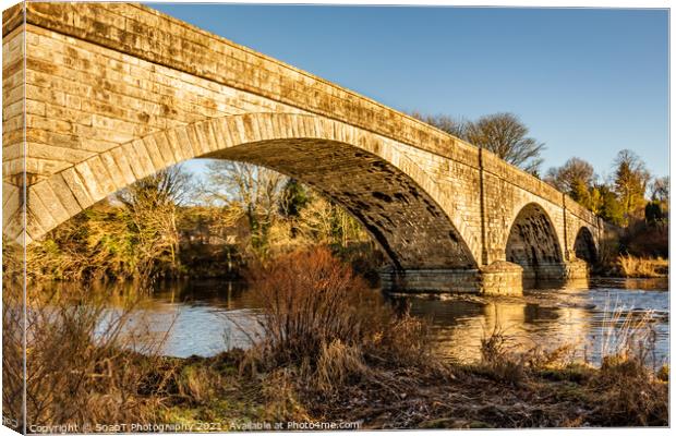 The arched Ken Bridge over the Water of Ken on a sunny winters day, Scotland Canvas Print by SnapT Photography