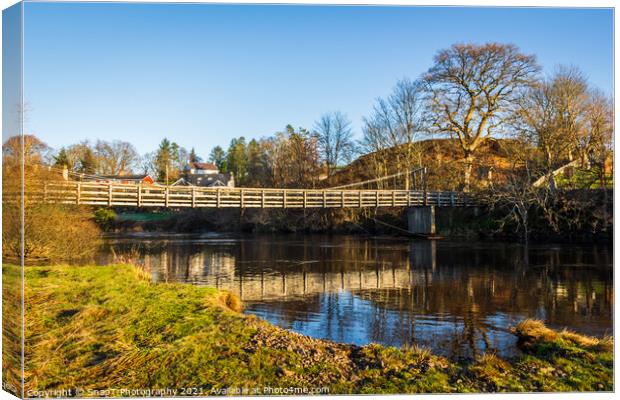 Boat Weil Wooden Suspension Bridge reflecting over the Water of Ken, Scotland Canvas Print by SnapT Photography