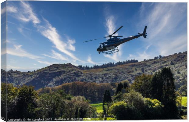 Helicopter flying low at Beddgelert Snowdonia  Canvas Print by Phil Longfoot