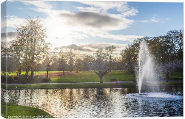 Fountain in a city park  Canvas Print by Phil Longfoot