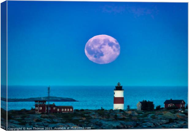 Lighthouse and Moonrise Canvas Print by Ron Thomas