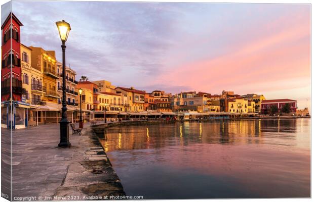 Sunrise at the old venetian harbour of Chania Canvas Print by Jim Monk