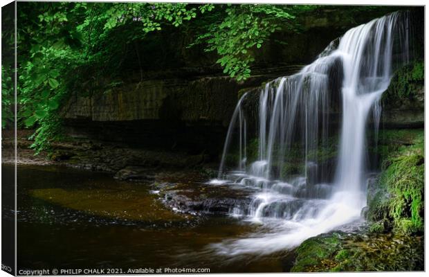 Dreamy Cauldron force waterfall in the village of West Burton Yorkshire dales.  Canvas Print by PHILIP CHALK