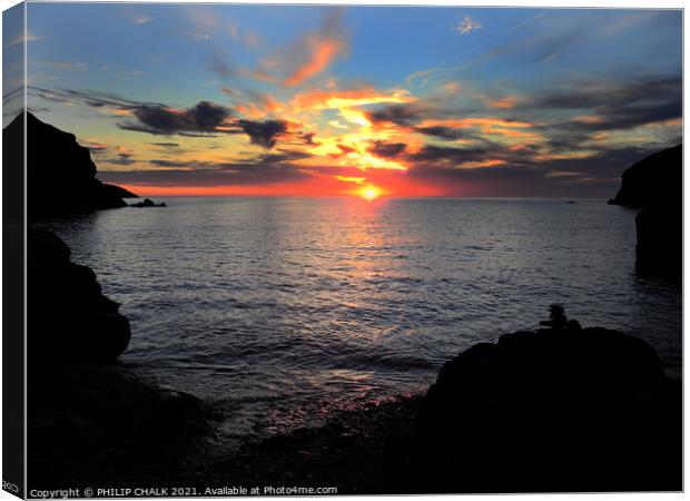 Final throws of light on the Pembrokeshire coast.  Canvas Print by PHILIP CHALK