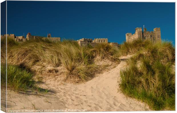 Bamburgh Castle Northumberland from the sandy beach 164 Canvas Print by PHILIP CHALK