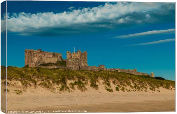 Bamburgh Castle Northumberland from the sandy beach 330 Canvas Print by PHILIP CHALK
