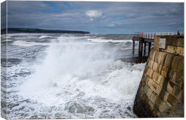 Whitby west pier with waves crashing through the gap 480  Canvas Print by PHILIP CHALK