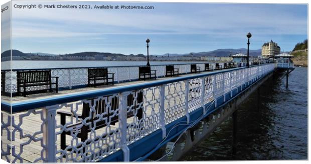 Llandudno pier from the side. Canvas Print by Mark Chesters