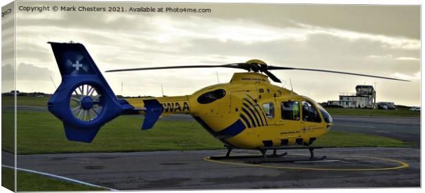 A Lifesaving Helicopter at Blackpool Airport Canvas Print by Mark Chesters