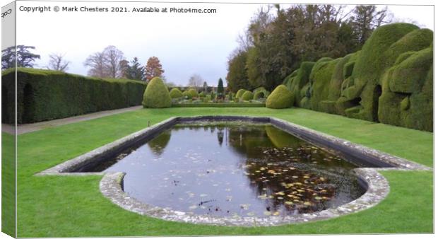Enchanting Topiary and Lilly Pond Canvas Print by Mark Chesters