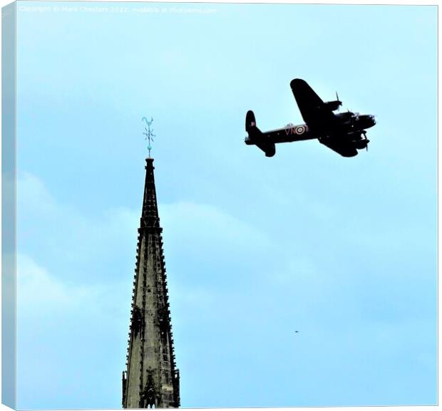 Majestic Lancaster Bomber at St Giles Catholic Chu Canvas Print by Mark Chesters