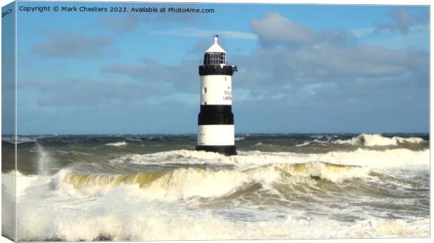 Majestic Penmon Lighthouse in Turbulent Seas Canvas Print by Mark Chesters
