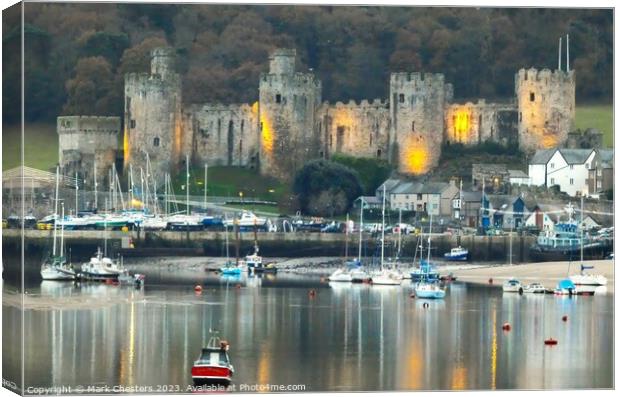 Conwy Castle and boats at dusk Canvas Print by Mark Chesters