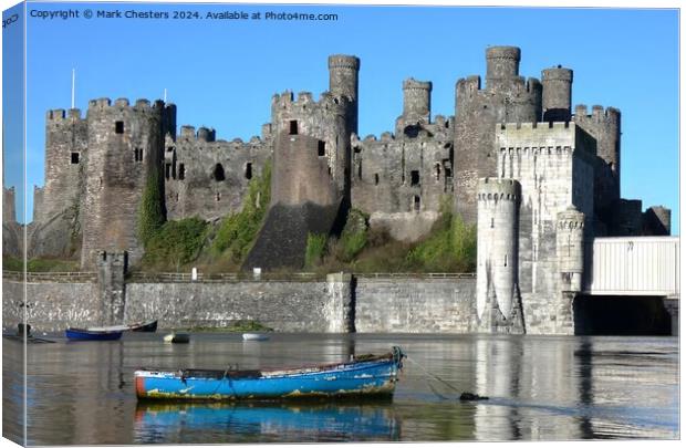 Conwy Castle and boats on a February day Canvas Print by Mark Chesters