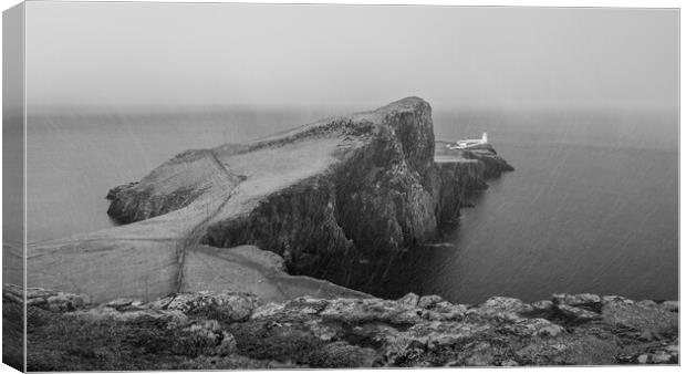 Neist Point Lighthouse in the snow  Canvas Print by Anthony McGeever