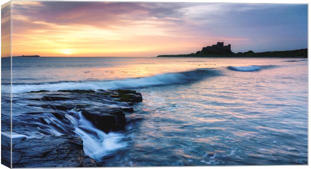Ethereal Sunrise on Bamburgh Beach  Canvas Print by Anthony McGeever