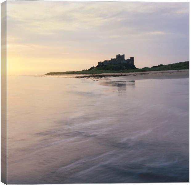Bamburgh Castle Sunrise  Canvas Print by Anthony McGeever
