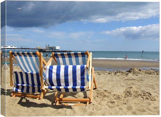 Deckchairs  Canvas Print by charles padley