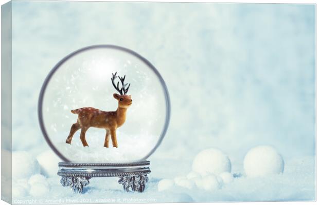 Winter Snow Globe With Reindeer Figure Canvas Print by Amanda Elwell