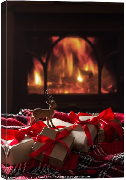 Christmas Gifts By The Fireplace Canvas Print by Amanda Elwell