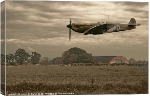 Mark 1 Supermarine Spitfire Flying Past Hanger Canvas Print by Amanda Elwell