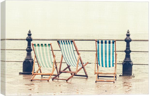 Deckchairs In The Rain At Torquay Canvas Print by Peter Greenway