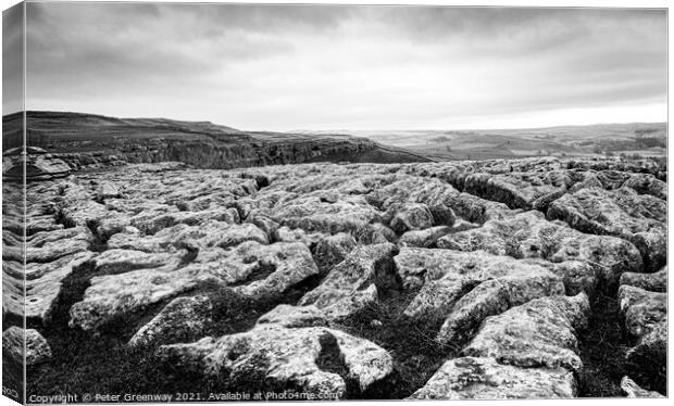 The Limestone Pavement On Top Of Malham Cove, York Canvas Print by Peter Greenway