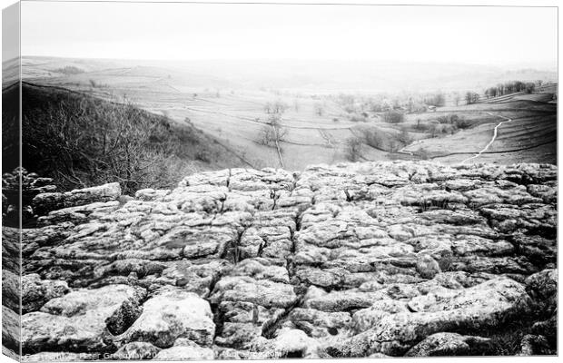 The Limestone Pavement On Top Of Malham Cove, York Canvas Print by Peter Greenway
