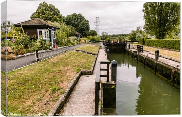 The Canal Lock At Northmoor, Oxfordshire Canvas Print by Peter Greenway