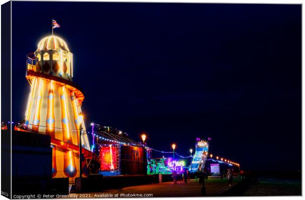 Illuminated Helter Skelter At The Hunstanton Seafront Funfair Canvas Print by Peter Greenway