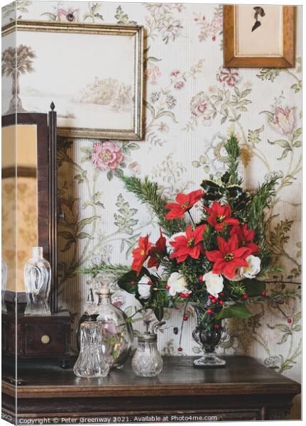 Vase Of Christmas Poinsettia's Canvas Print by Peter Greenway