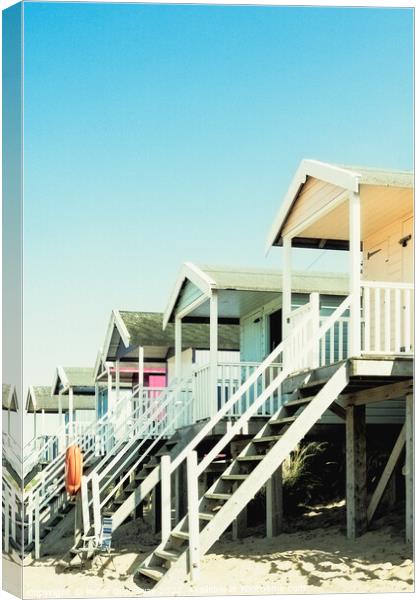 Stilted Beach Huts On The Beach At Wells-next-the-Sea Canvas Print by Peter Greenway