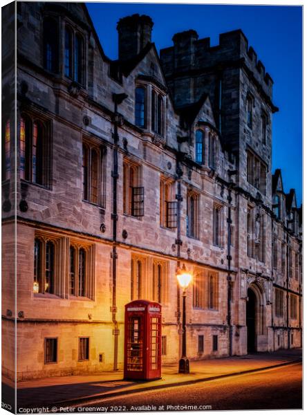 Illuminated Iconic Red British Telephone Box In Oxford City Centre Canvas Print by Peter Greenway
