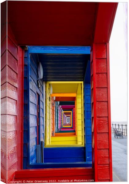 View Through The Porches Of Colourful Wooden Beach Huts At Saltb Canvas Print by Peter Greenway