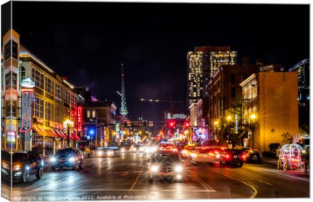 Jumping Downtown Nashville, Tennessee On A Saturday Night Canvas Print by Peter Greenway