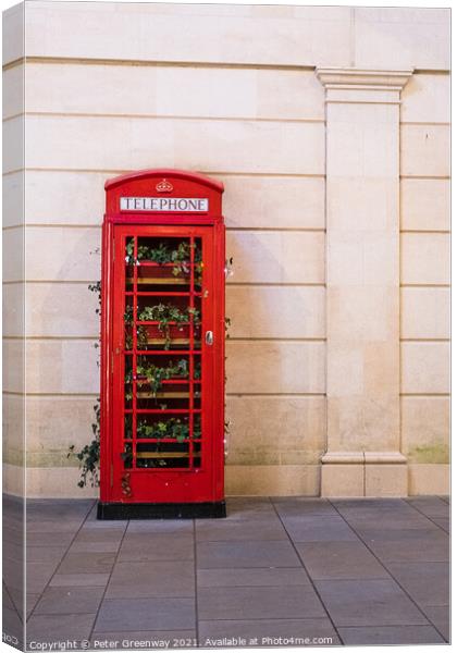 Iconic Red Telephone Box In Bath ( Decorated ) Canvas Print by Peter Greenway