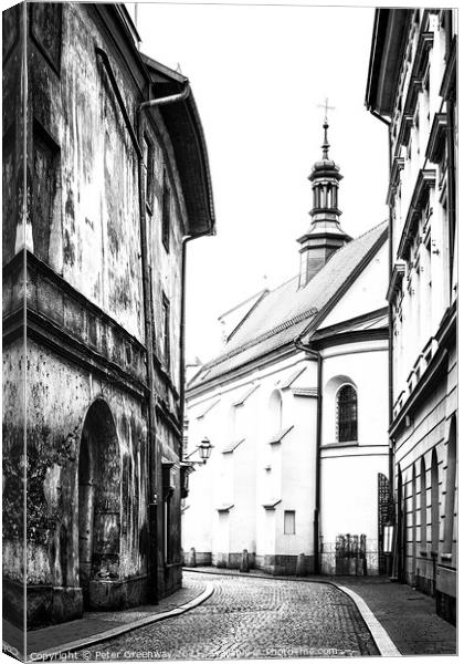 Cobbled Street & A Church In The Old Town In Kracow Canvas Print by Peter Greenway