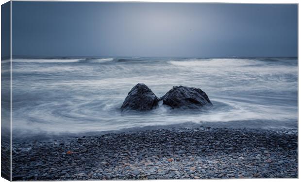 Two Rocks in the ocean Canvas Print by Chuck Koonce