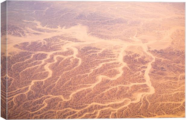 Aerial airplane view of barren Sahara desert landscape in Egypt Canvas Print by Mirko Kuzmanovic