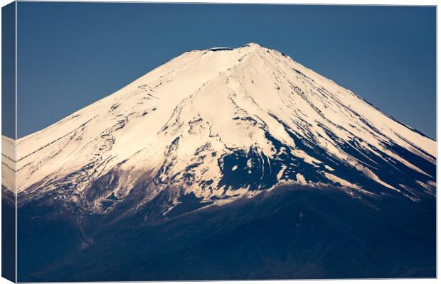 Snow capped peak of Mt. Fuji, symbol of Japan Canvas Print by Mirko Kuzmanovic