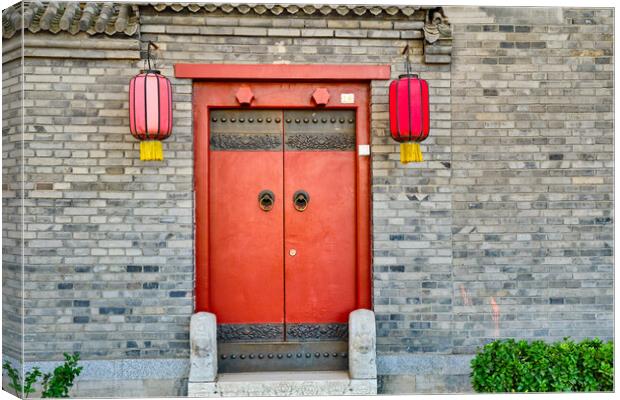 Traditional Hutong alley in Beijing, China, Vintage door with red lanterns Canvas Print by Mirko Kuzmanovic